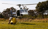 Helicopter landing with bucket