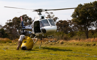 Helicopter landing with bucket